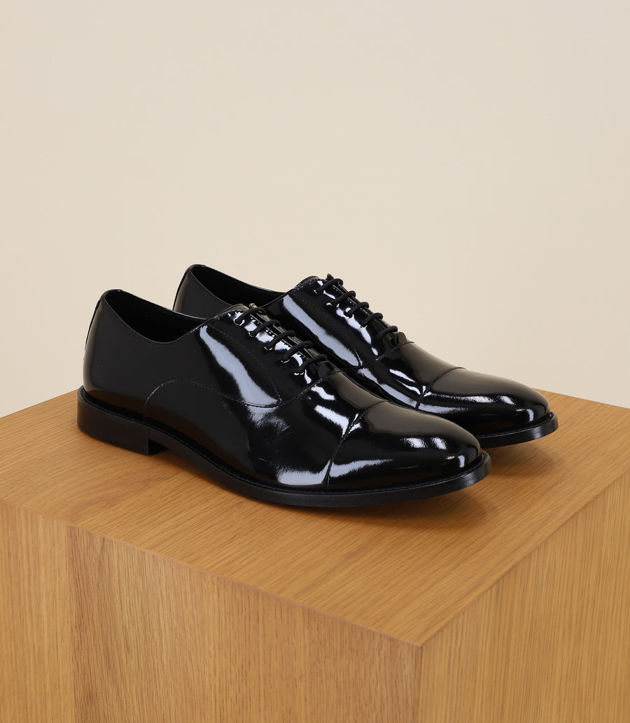 Black patent derby shoes