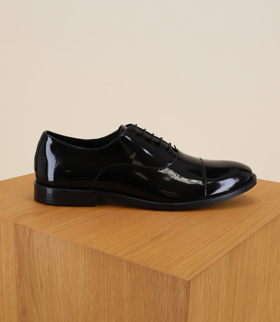 Black patent derby shoes