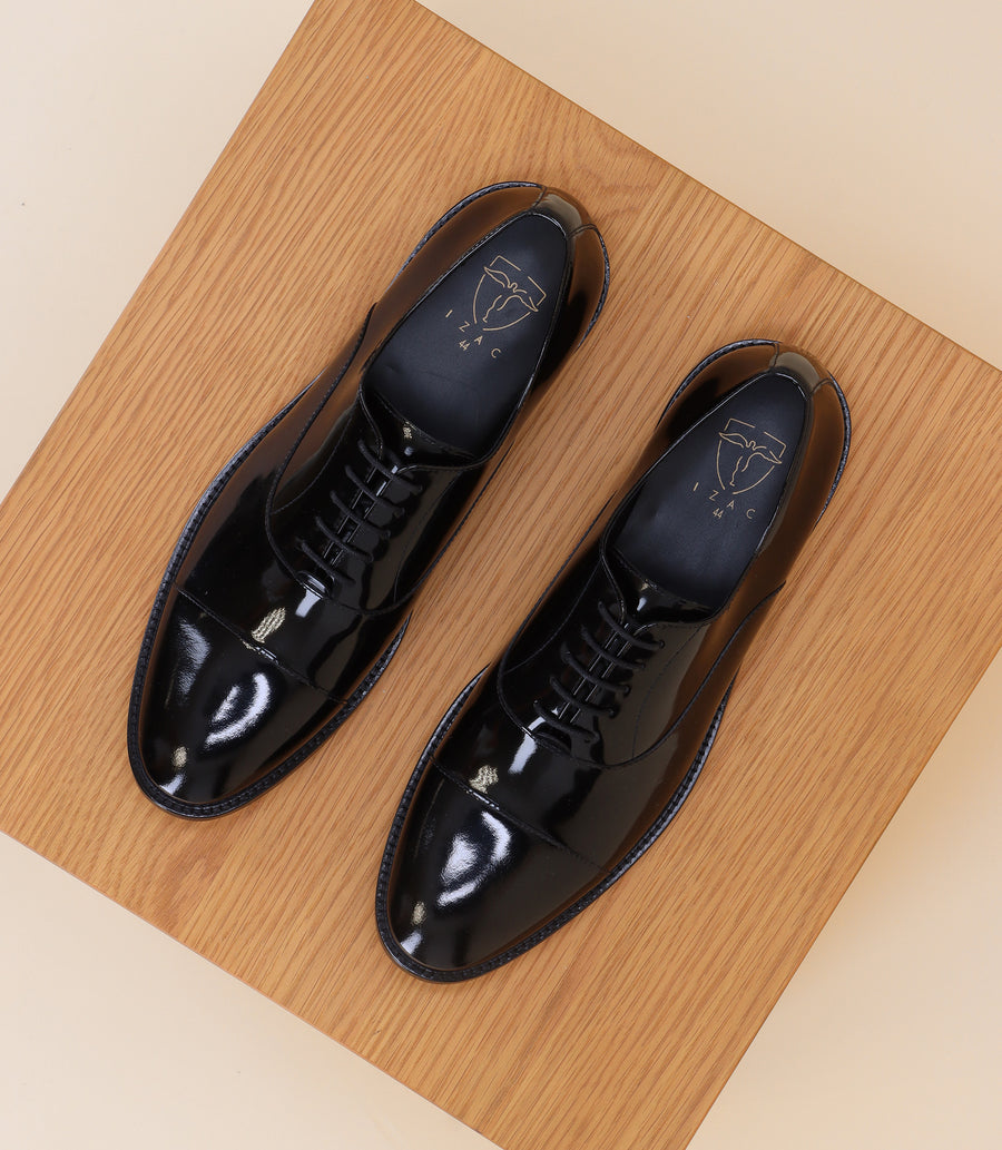 Black patent derby shoes