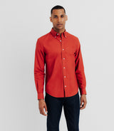 Shirt with orange buttoned collar