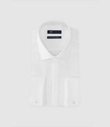 Shirt with white engraved button