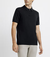 Polo with black zipped neck