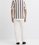 Ecru striped knit polo shirt