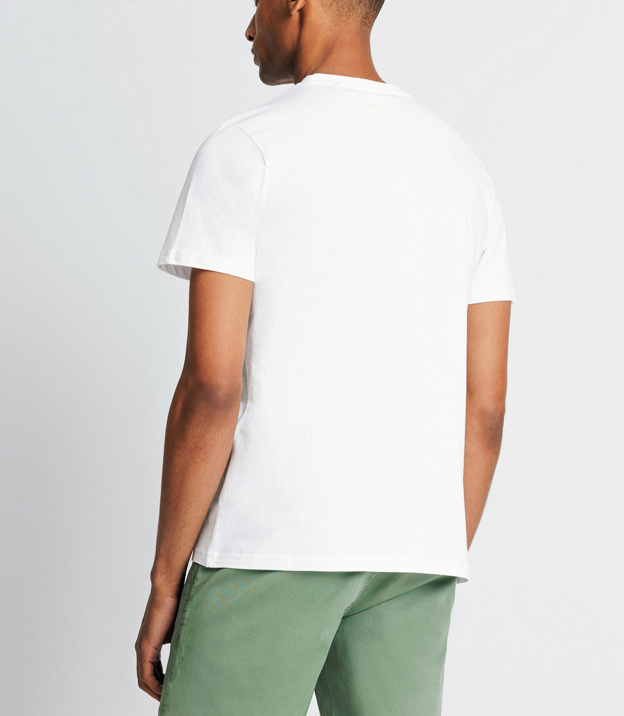 White pocket Ts