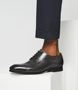 Elvio" couture black leather derby