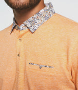 Orangefarbenes kurzärmeliges Poloshirt "Guylaine".